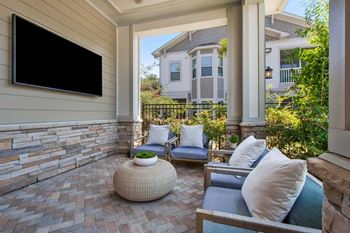 Indoor and outdoor kitchens with lounging areas